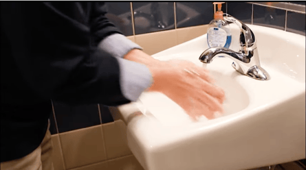 man washing hands